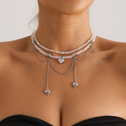 Crystal heart fringe necklace with layered silver-tone chains