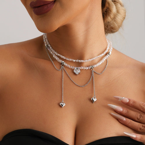 Y2K crystal heart fringe necklace worn with an evening outfit